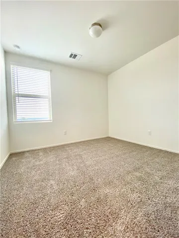 an empty room with a natural light