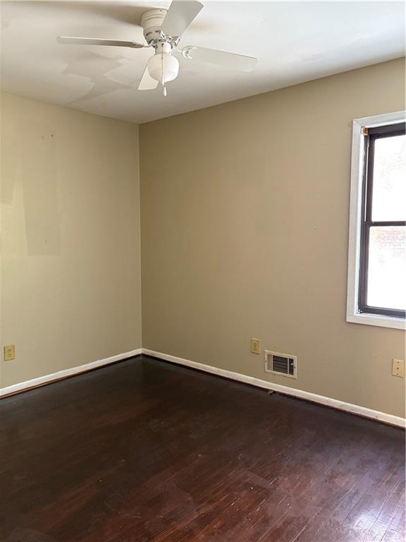 2891 Bianca Court Decatur, GA 30034 - Photo 14 of 22 an empty room with wooden floor and windows