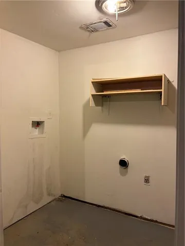 a view of room with wooden ceiling