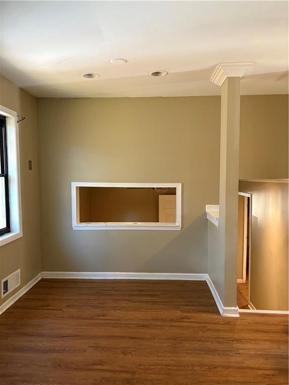 2891 Bianca Court Decatur, GA 30034 - Photo 5 of 22 a view of an empty room with wooden floor and a window