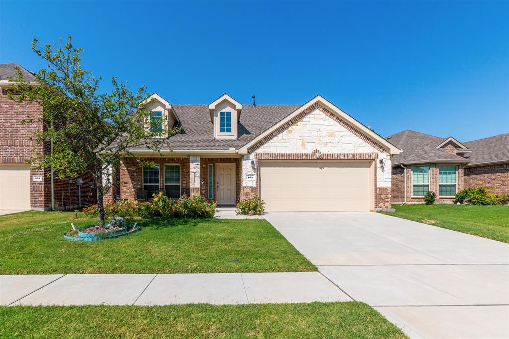 504 Rocky Pine Road McKinney, TX 75072 - Photo 2 of 36 View of front of home with a front yard, a garage, brick siding, and driveway