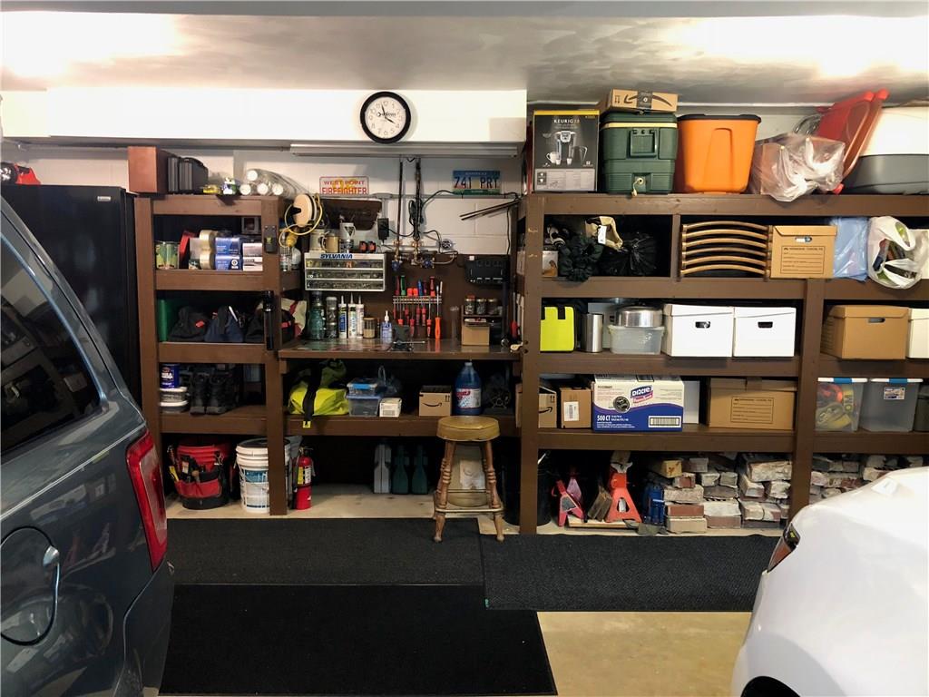 451 Slate Run Road Greensburg, PA 15601 - Photo 25 of 25 Large garage with workshop and plenty of shelves for all of your storage.