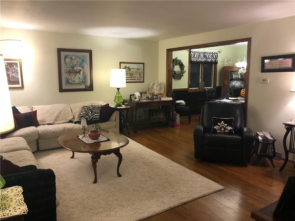 451 Slate Run Road Greensburg, PA 15601 - Photo 6 of 25 Large living room to dining room.