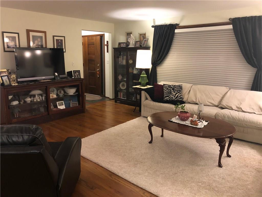 451 Slate Run Road Greensburg, PA 15601 - Photo 7 of 25 Living room with beautiful hardwood floors.