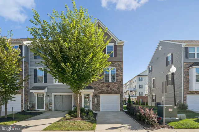 a view of a building with a tree