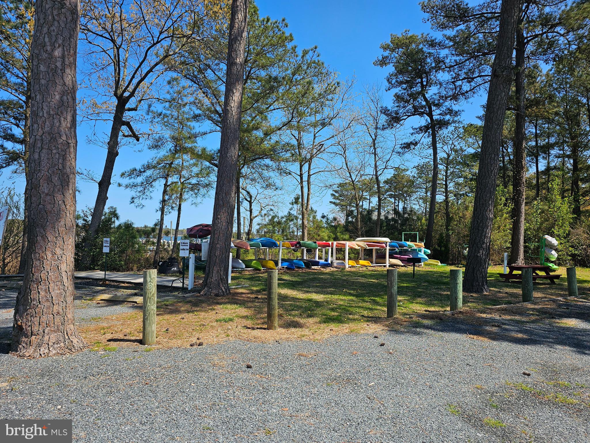 136 Salt Spray Drive Berlin, MD 21811 - Photo 24 of 39 a view of a park with swings and slides