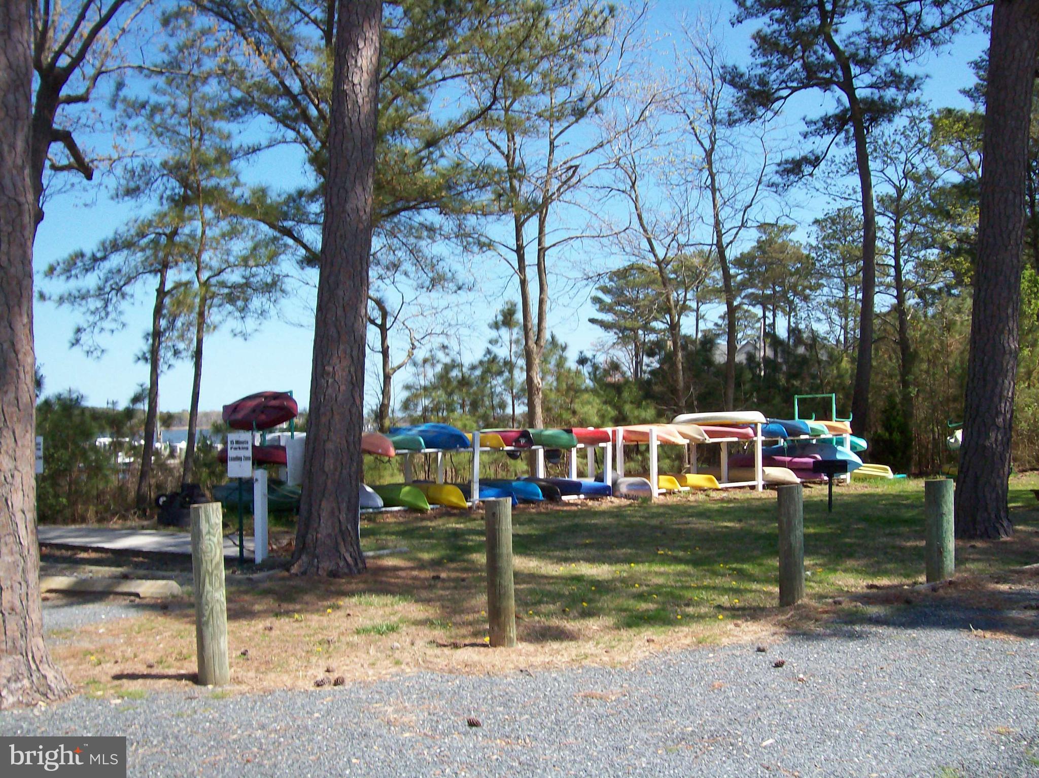 136 Salt Spray Drive Berlin, MD 21811 - Photo 25 of 39 a view of a house with a yard and sitting area