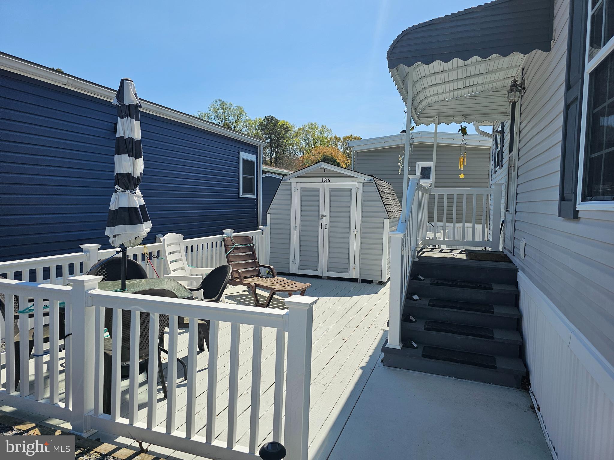 136 Salt Spray Drive Berlin, MD 21811 - Photo 8 of 39 a view of a house with a deck
