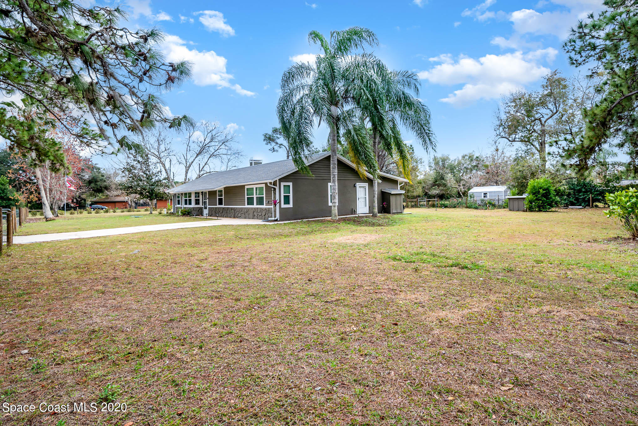 4350 Hunter Street Mims, FL 32754 - Photo 2 of 26 Side Front North