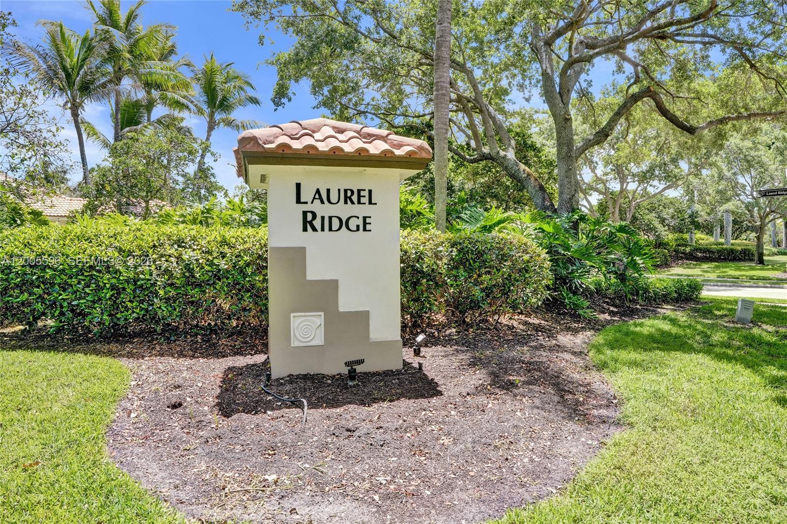4281 Laurel Ridge Circle Weston, FL 33331 - Photo 71 of 80 a sign that is sitting in the middle of a yard