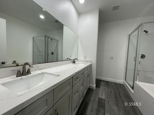 846 Harriet Street Ridgecrest, CA 93555 - Photo 17 of 21 a bathroom with a sink and a mirror