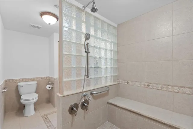 a view of a patio with a table and chairs