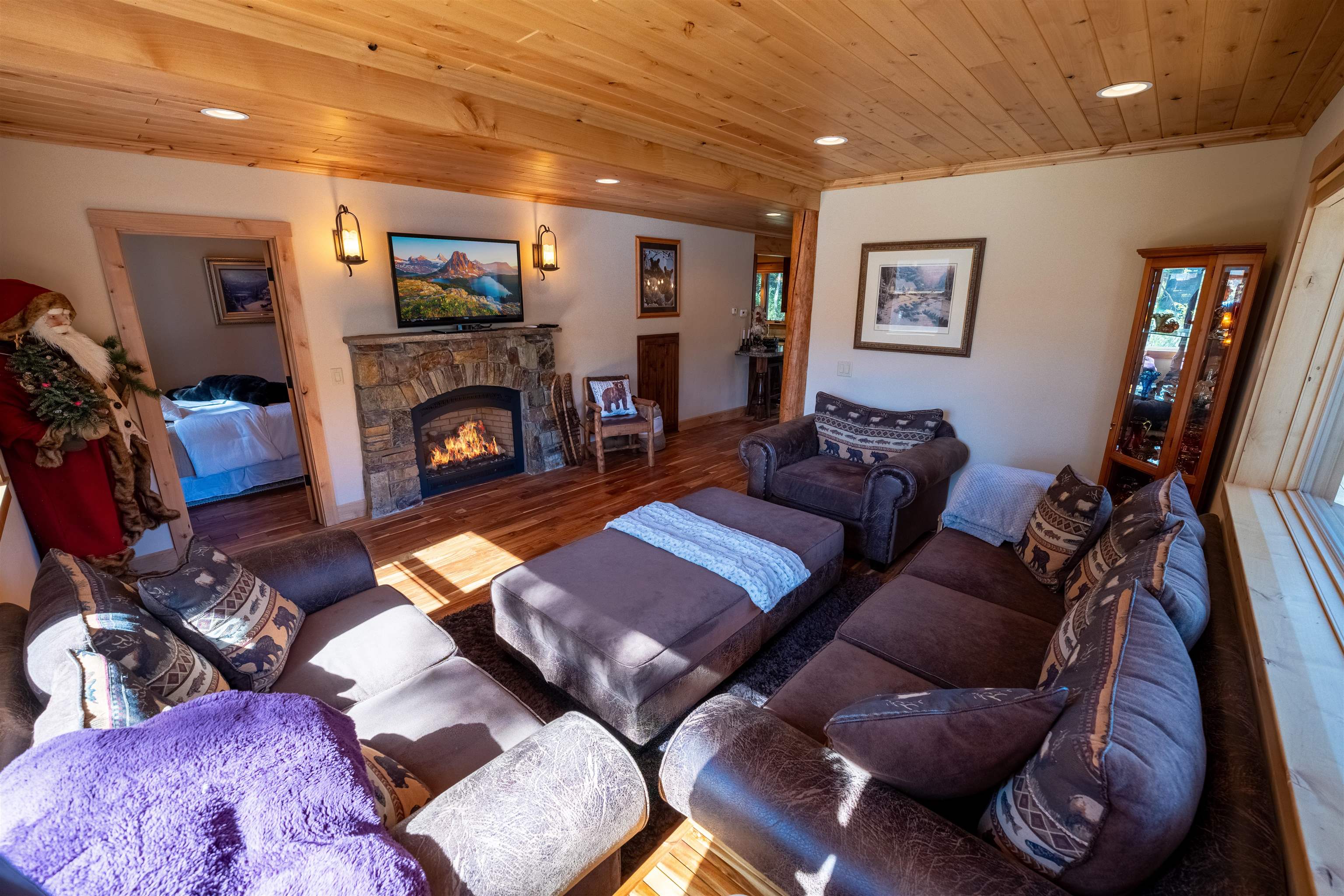 14942 Donner Pass Road Truckee, CA 96161 - Photo 13 of 21 a living room with furniture and a fireplace