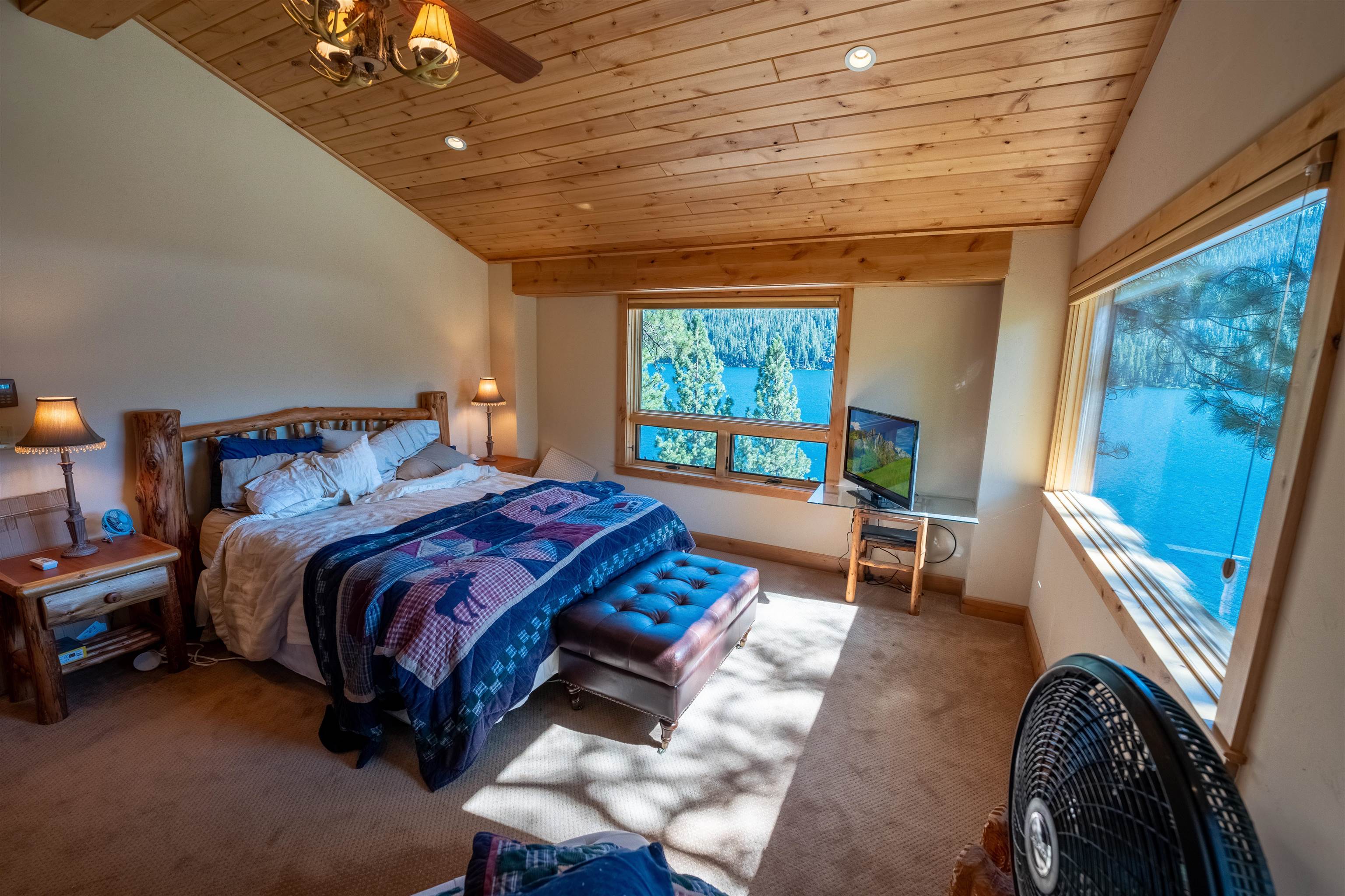 14942 Donner Pass Road Truckee, CA 96161 - Photo 16 of 21 a bedroom with a bed and a window