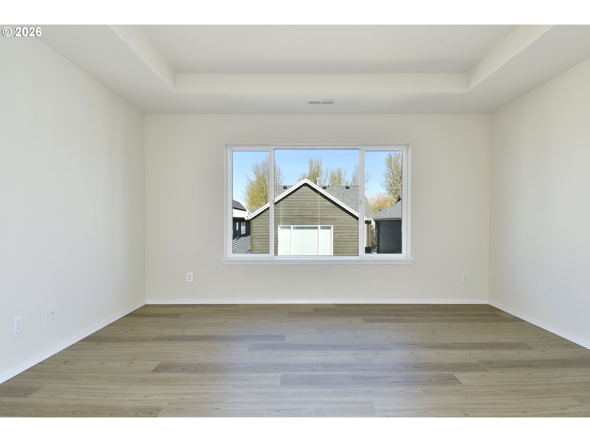 20477 Southwest Marimar Street Beaverton, OR 97078 - Photo 19 of 28 a view of wooden floor in a room