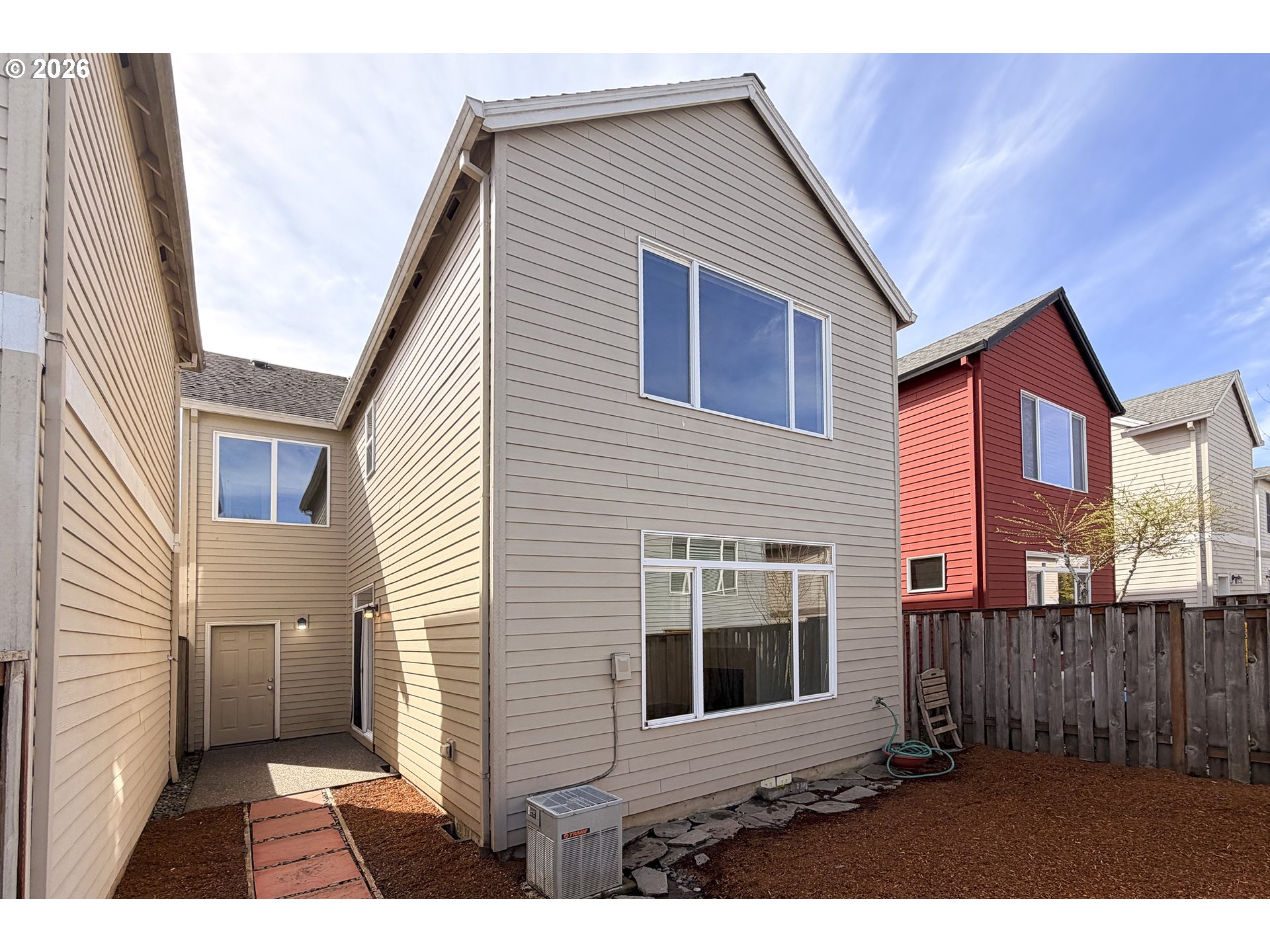 20477 Southwest Marimar Street Beaverton, OR 97078 - Photo 26 of 28 a view of a house with a backyard