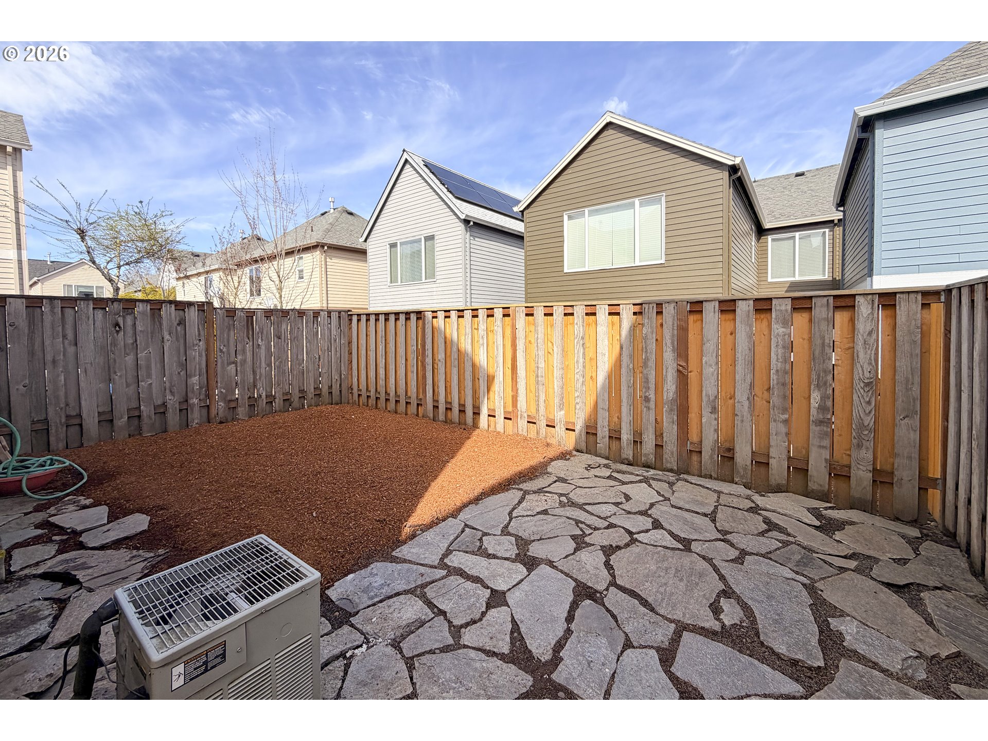 20477 Southwest Marimar Street Beaverton, OR 97078 - Photo 27 of 28 a front view of a house with a yard