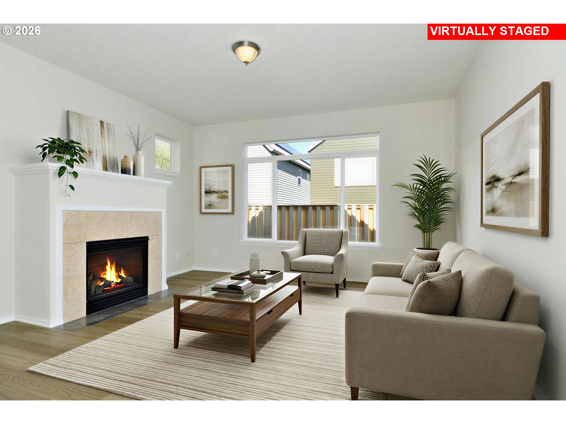 20477 Southwest Marimar Street Beaverton, OR 97078 - Photo 4 of 28 a living room with furniture and a fireplace