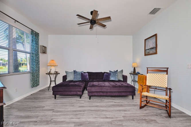 20012 Heatherstone Way, Unit 1 Estero, FL 33928 - Photo 12 of 48 a living room with couch and a window
