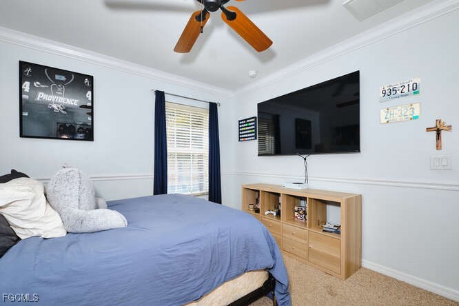 20012 Heatherstone Way, Unit 1 Estero, FL 33928 - Photo 32 of 48 a bedroom with a bed and a flat screen tv
