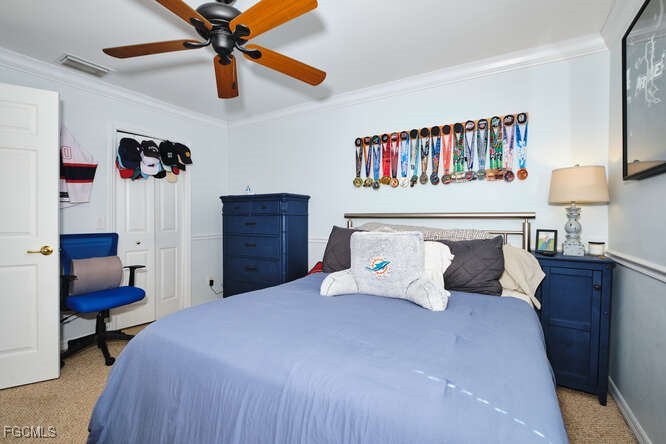 20012 Heatherstone Way, Unit 1 Estero, FL 33928 - Photo 33 of 48 a bedroom with a bed and a chandelier