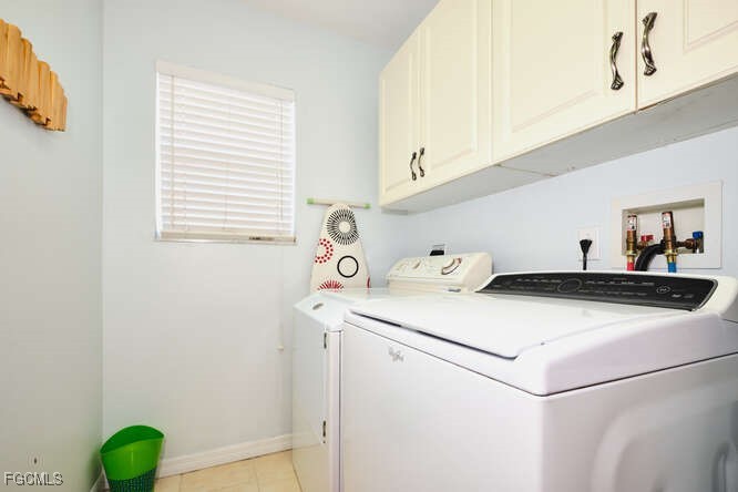 20012 Heatherstone Way, Unit 1 Estero, FL 33928 - Photo 39 of 48 a utility room with dryer and washer