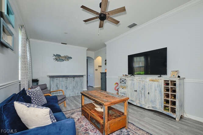 20012 Heatherstone Way, Unit 1 Estero, FL 33928 - Photo 4 of 48 a living room with furniture and a flat screen tv