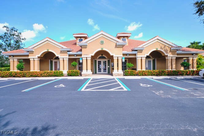 20012 Heatherstone Way, Unit 1 Estero, FL 33928 - Photo 45 of 48 a view of outdoor space yard and front view of a house