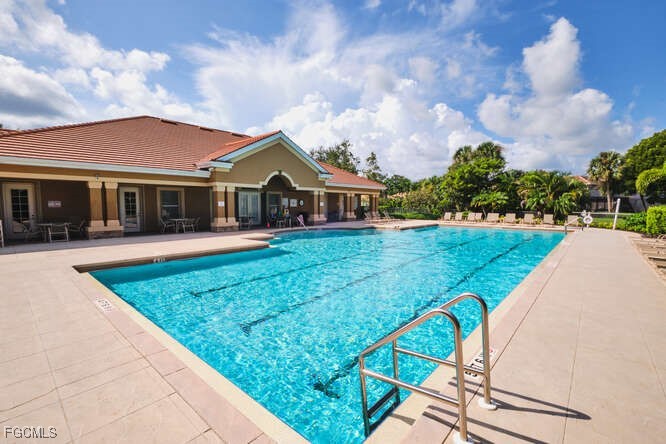 20012 Heatherstone Way, Unit 1 Estero, FL 33928 - Photo 46 of 48 a view of a house with a yard