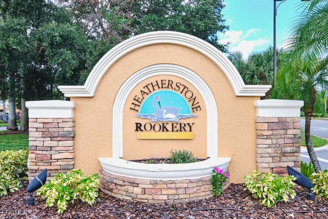 20012 Heatherstone Way, Unit 1 Estero, FL 33928 - Photo 47 of 48 a sign that is on the side of the building