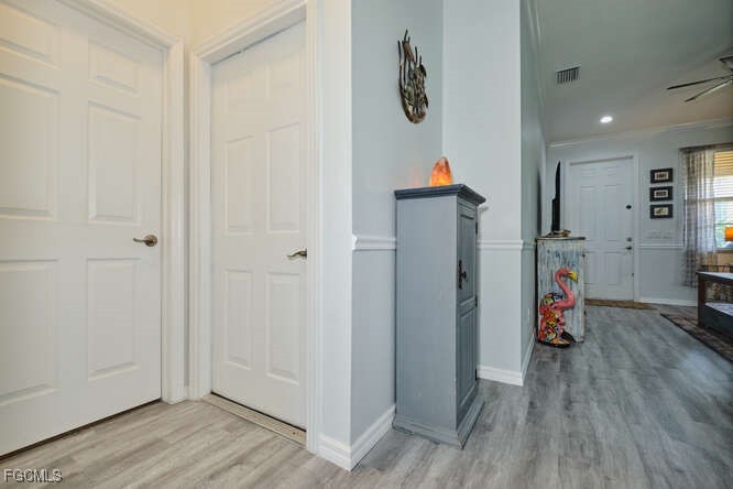 20012 Heatherstone Way, Unit 1 Estero, FL 33928 - Photo 6 of 48 a view of an entryway with wooden floor
