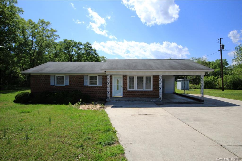 2688 South Potter Road Heath Springs, SC 29058 - Photo 1 of 12 a front view of house with yard and green space