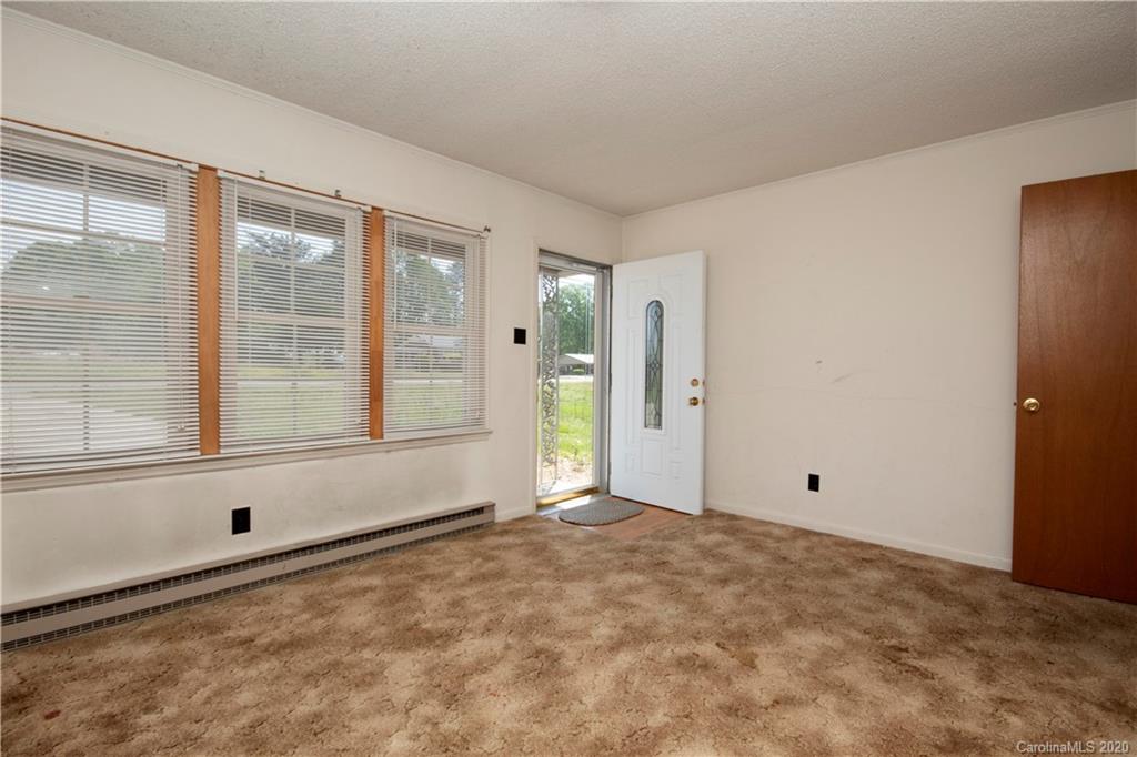 2688 South Potter Road Heath Springs, SC 29058 - Photo 5 of 12 a view of an empty room with a window