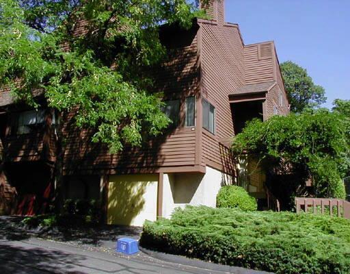 45 Sunrise Hill Road, Unit 45 Norwalk, CT 06851 - Photo 1 of 1 a front view of a house with garden