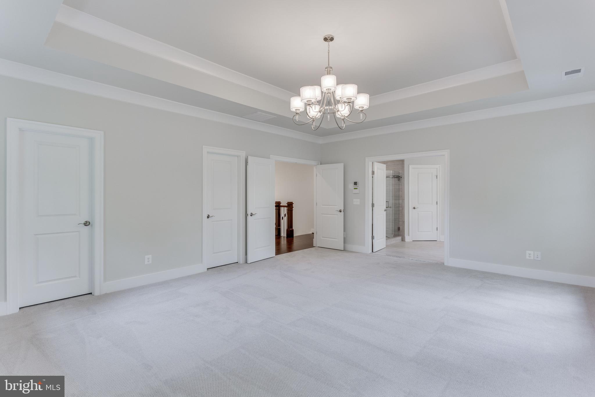 307 Cabin Road Southeast Vienna, VA 22180 - Photo 20 of 25 a view of an empty room with a chandelier