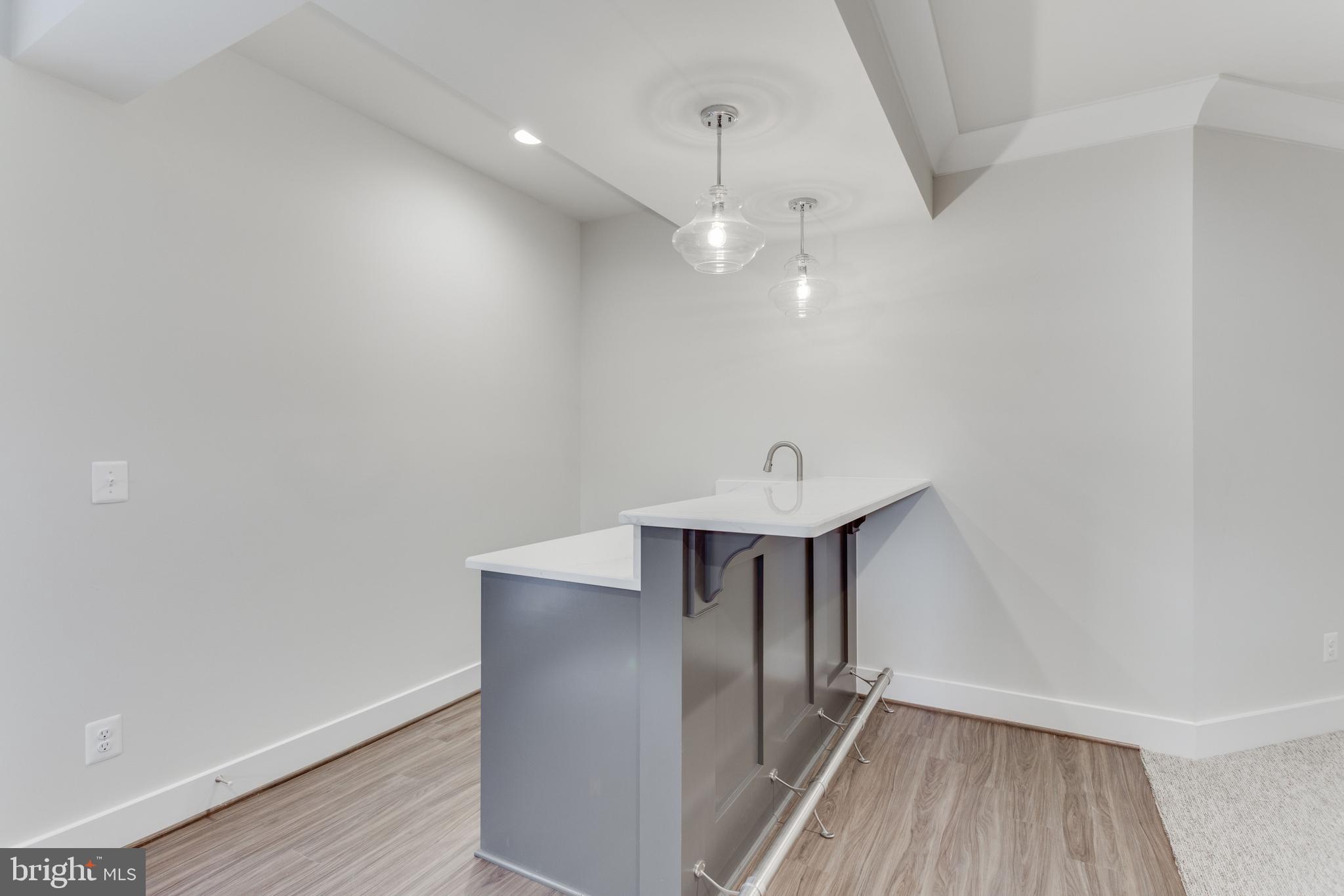 307 Cabin Road Southeast Vienna, VA 22180 - Photo 21 of 25 a view of a hallway with wooden floor and staircase
