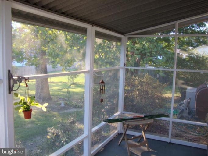 19607 Three Notch Road Lexington Park, MD 20653 - Photo 7 of 10 Screened-in Porch