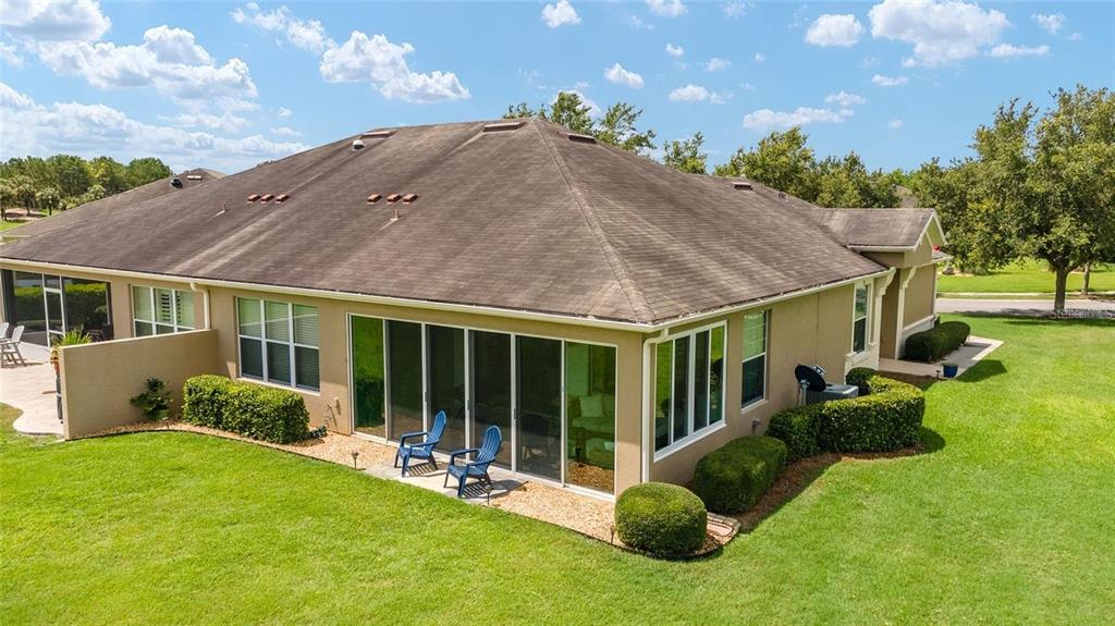 6776 Southwest 91st Circle Ocala, FL 34481 - Photo 12 of 60 a view of a house with backyard and porch