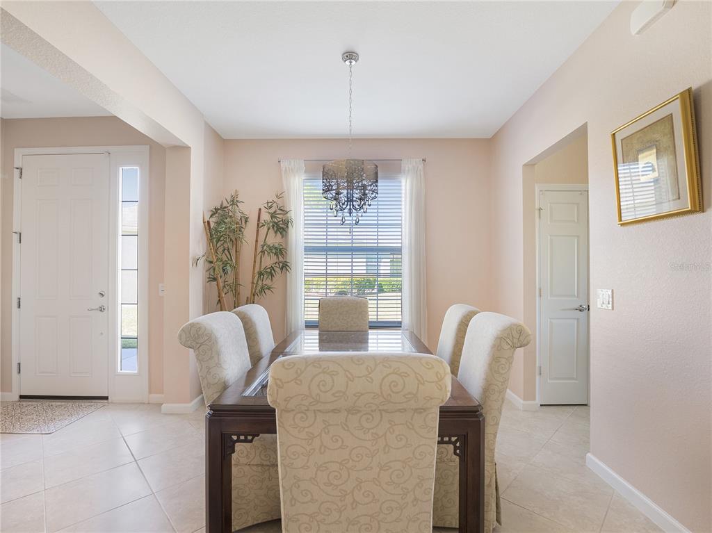 6776 Southwest 91st Circle Ocala, FL 34481 - Photo 30 of 60 a view of a dining room with furniture window and outside view