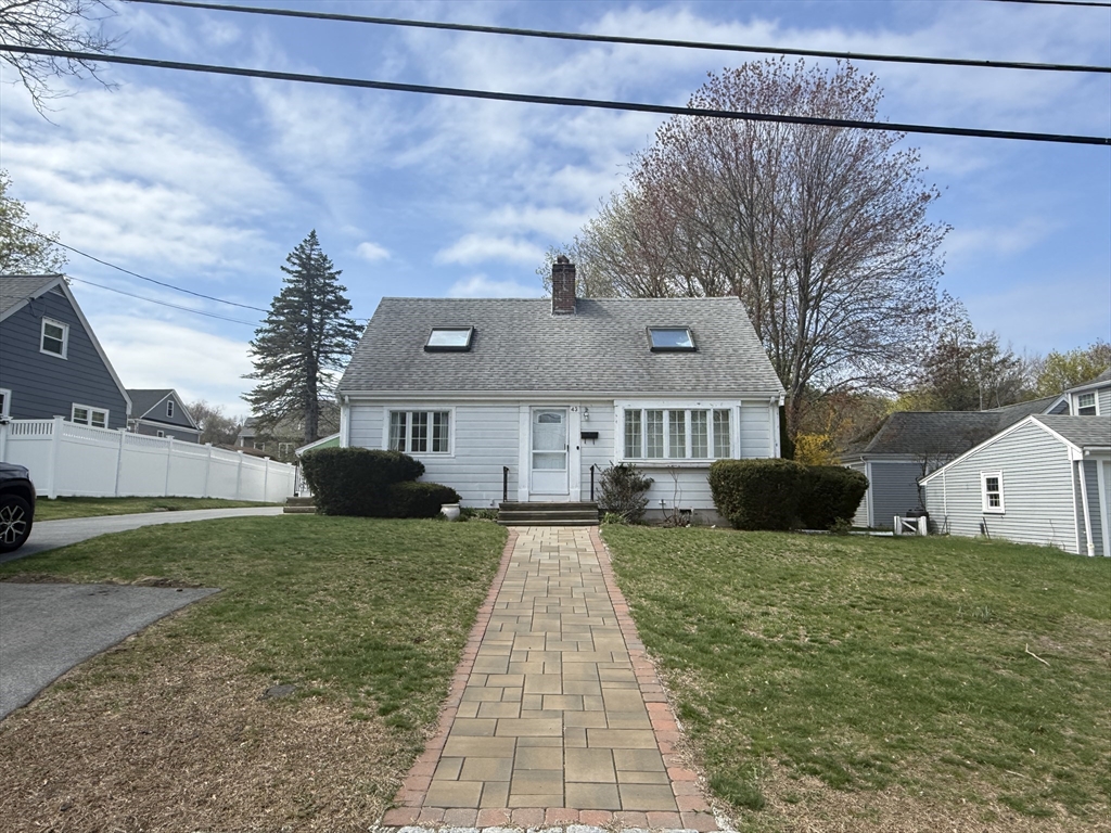 43 Hillcroft Road, Unit 43 Waltham, MA 02452 - Photo 2 of 20 a view of a house with a yard