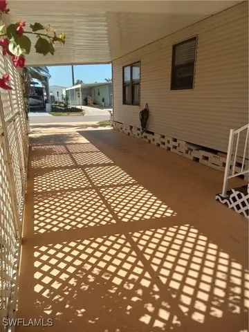 a view of a terrace with wooden floor