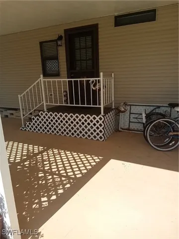 a view of a balcony with a swing