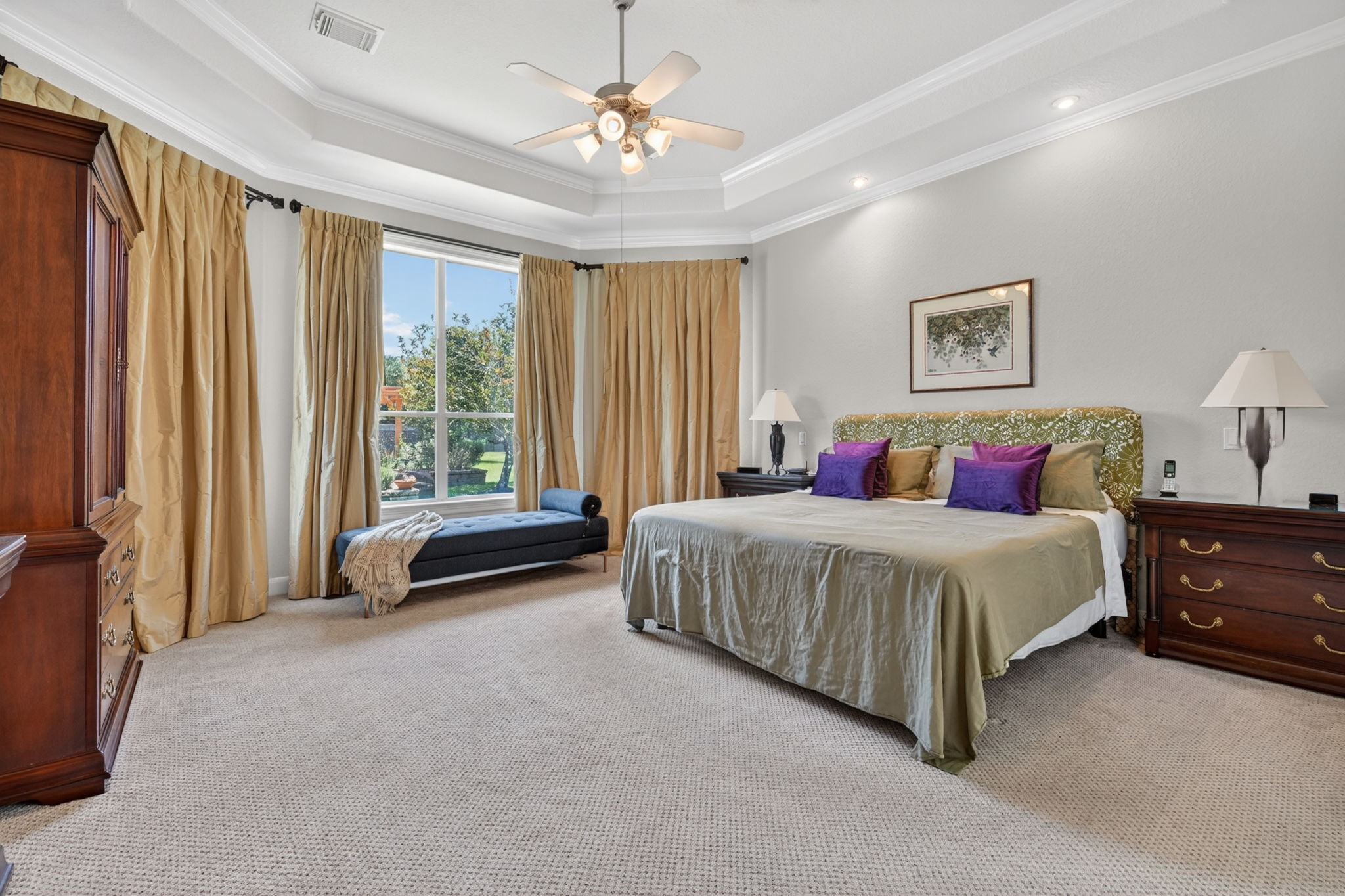 15 White Meadow Court Spring, TX 77379 - Photo 17 of 48 Lovely primary bedroom on main floor with bright views of backyard. Custom drapes with black out feature are included. Reading lights above bed.