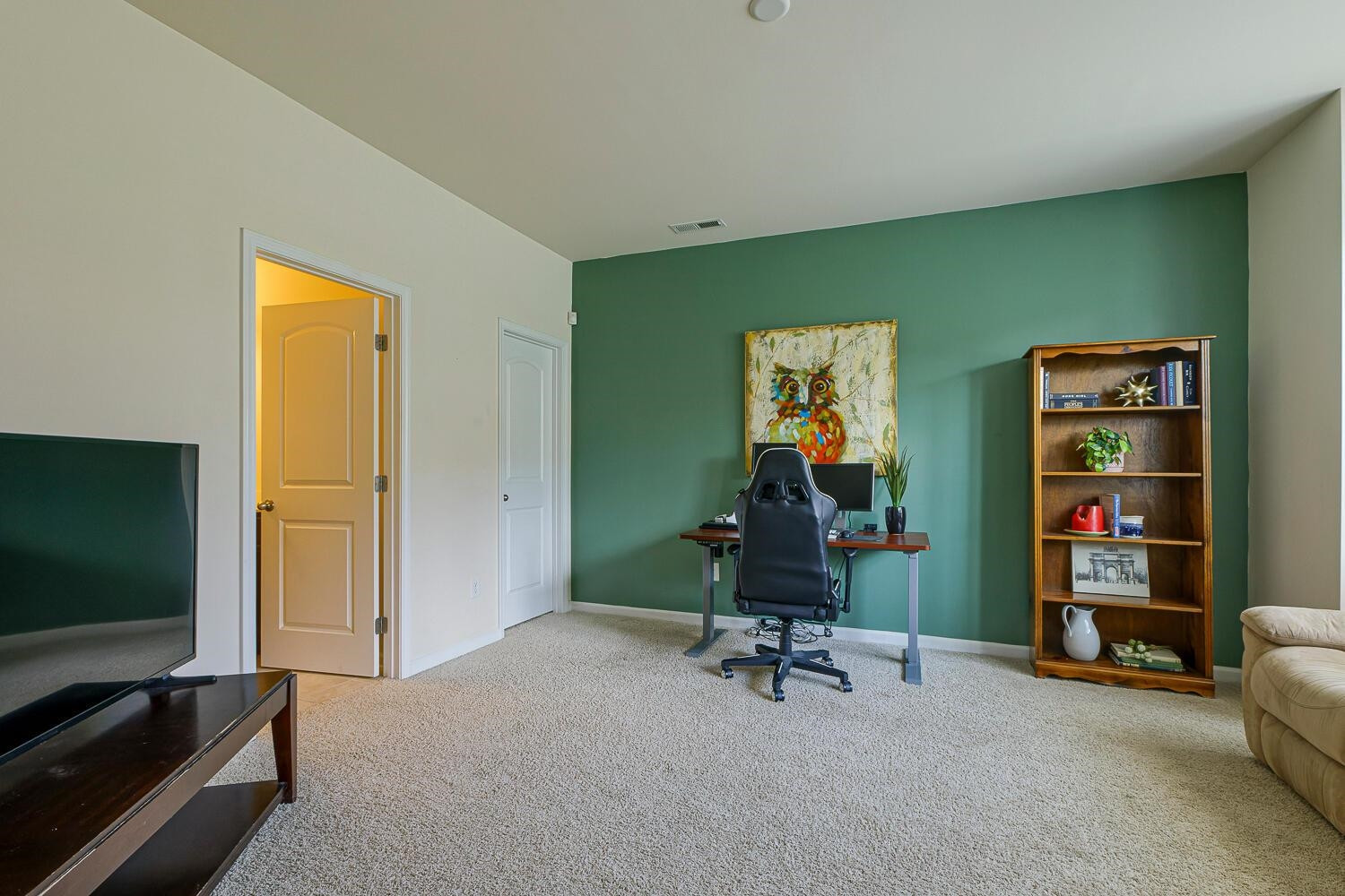 9108 Wooden Road Raleigh, NC 27617 - Photo 5 of 34 First Stop! Lower Level Ensuite Bedroom or Bonus