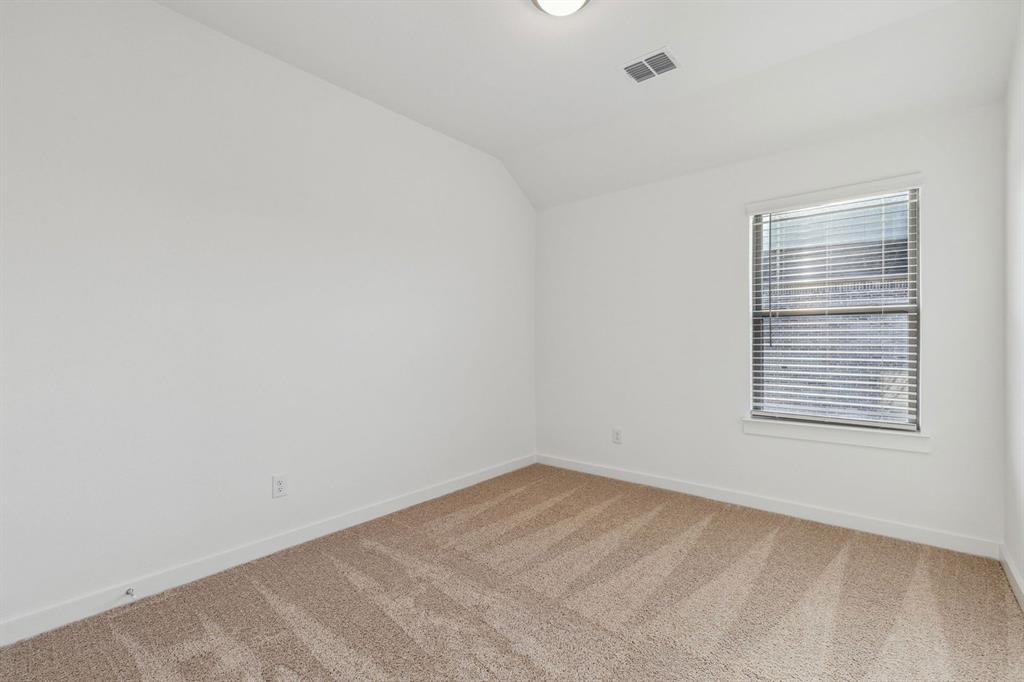 876 Sunflower Road Lavon, TX 75166 - Photo 24 of 31 Bedroom in the Oak II home plan by Trophy Signature Homes – REPRESENTATIVE PHOTO