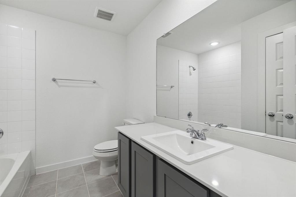 876 Sunflower Road Lavon, TX 75166 - Photo 27 of 31 Bathroom in the Oak II home plan by Trophy Signature Homes – REPRESENTATIVE PHOTO