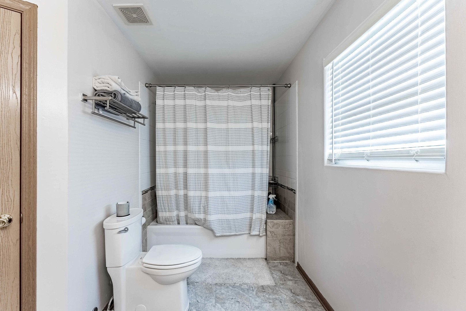 5302 Meadowbrook Street Plainfield, IL 60586 - Photo 21 of 46 a bathroom with a toilet and a shower