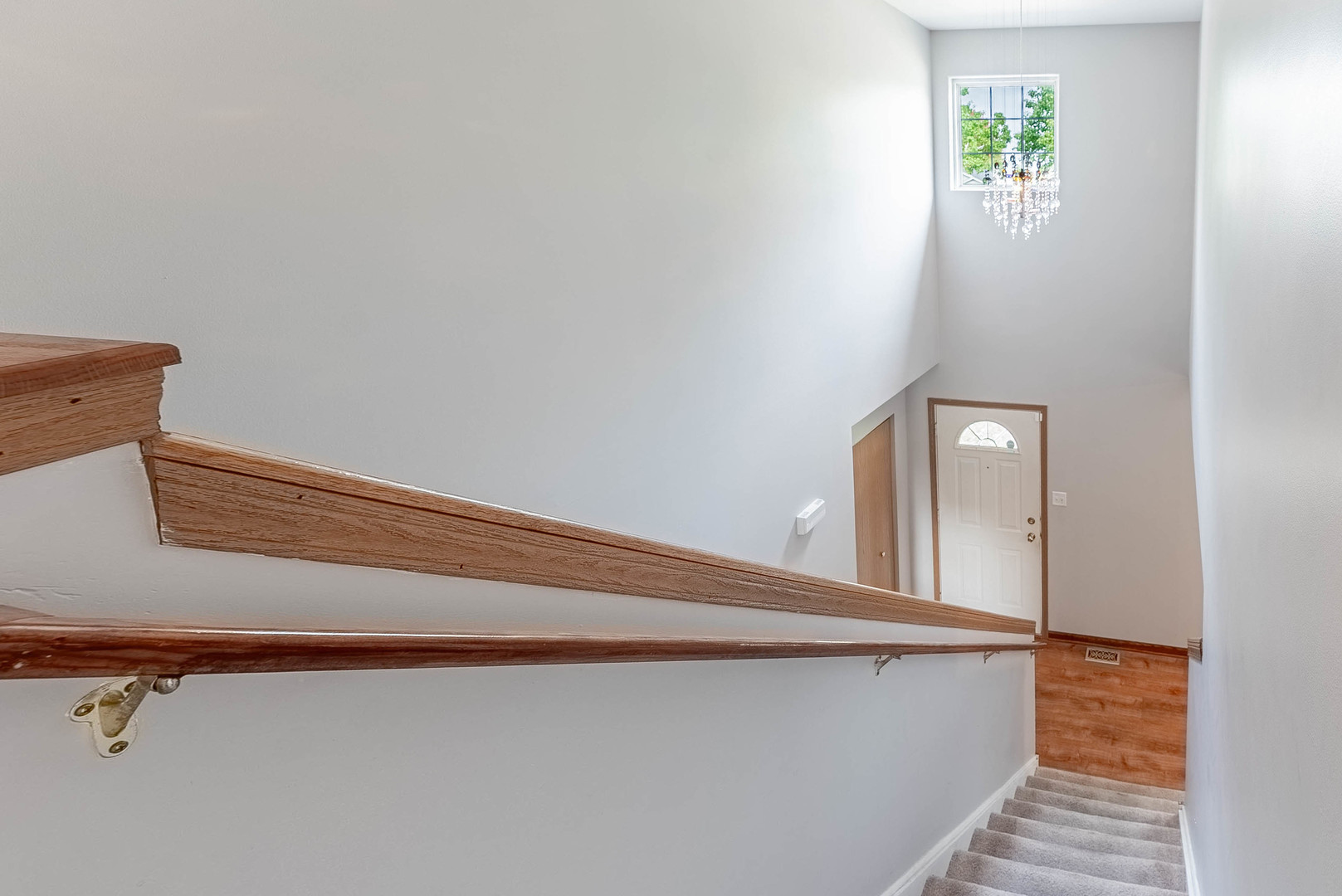 5302 Meadowbrook Street Plainfield, IL 60586 - Photo 30 of 46 a view of a hallway with staircase