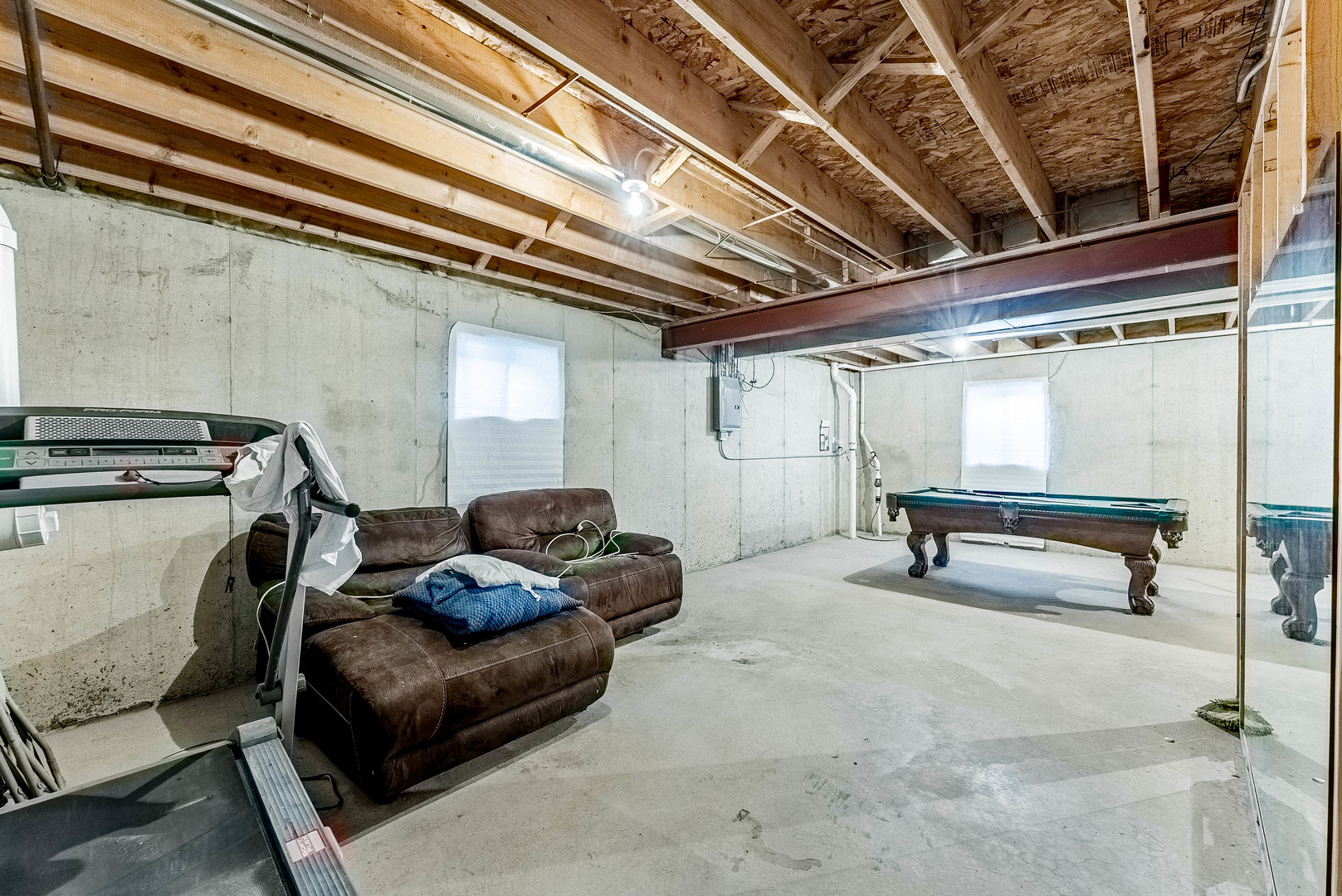 5302 Meadowbrook Street Plainfield, IL 60586 - Photo 33 of 46 a living room with furniture and a ceiling fan