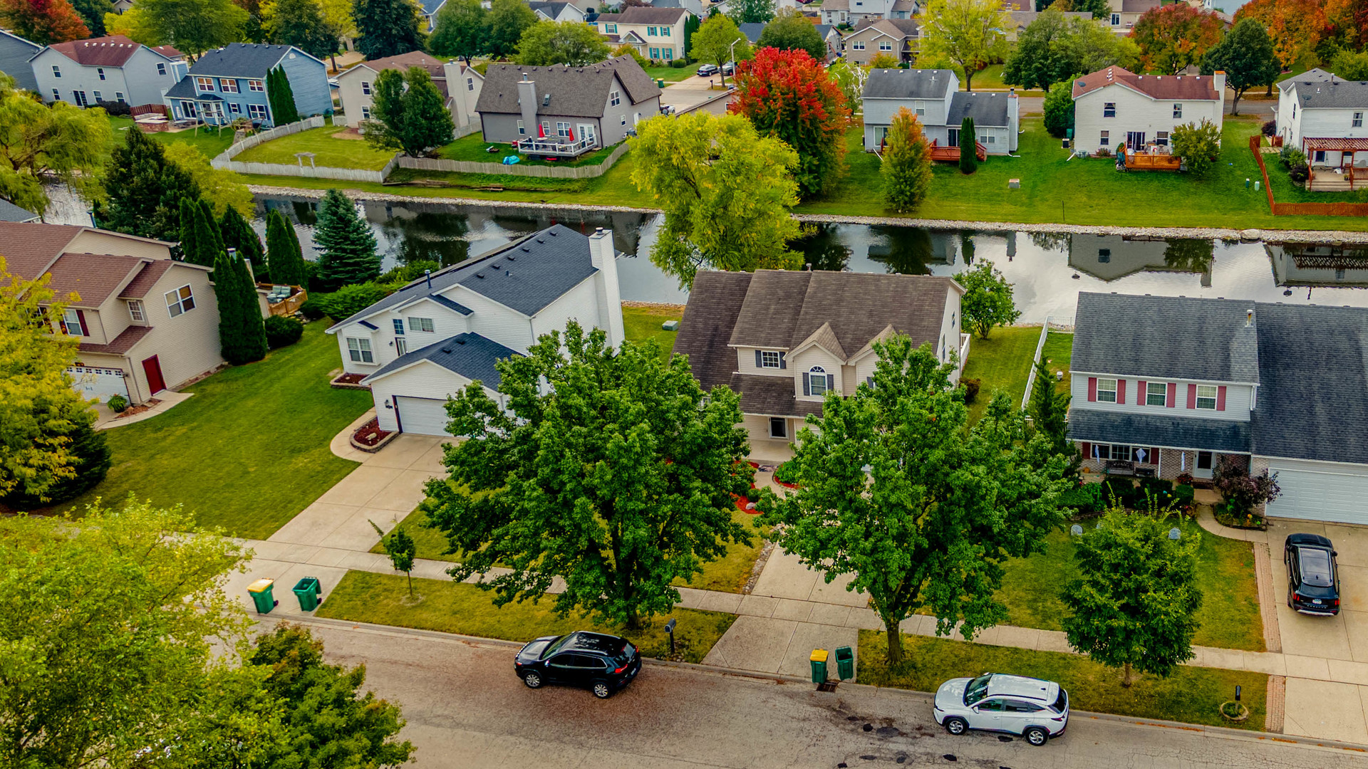 5302 Meadowbrook Street Plainfield, IL 60586 - Photo 35 of 46 an aerial view of a house with garden space and street view